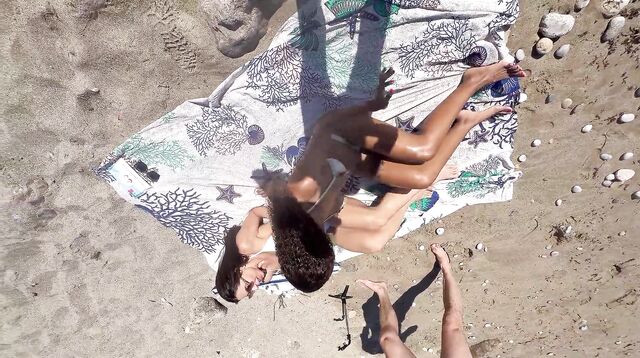 Brazilian women having sex with foreign men on a nudist beach